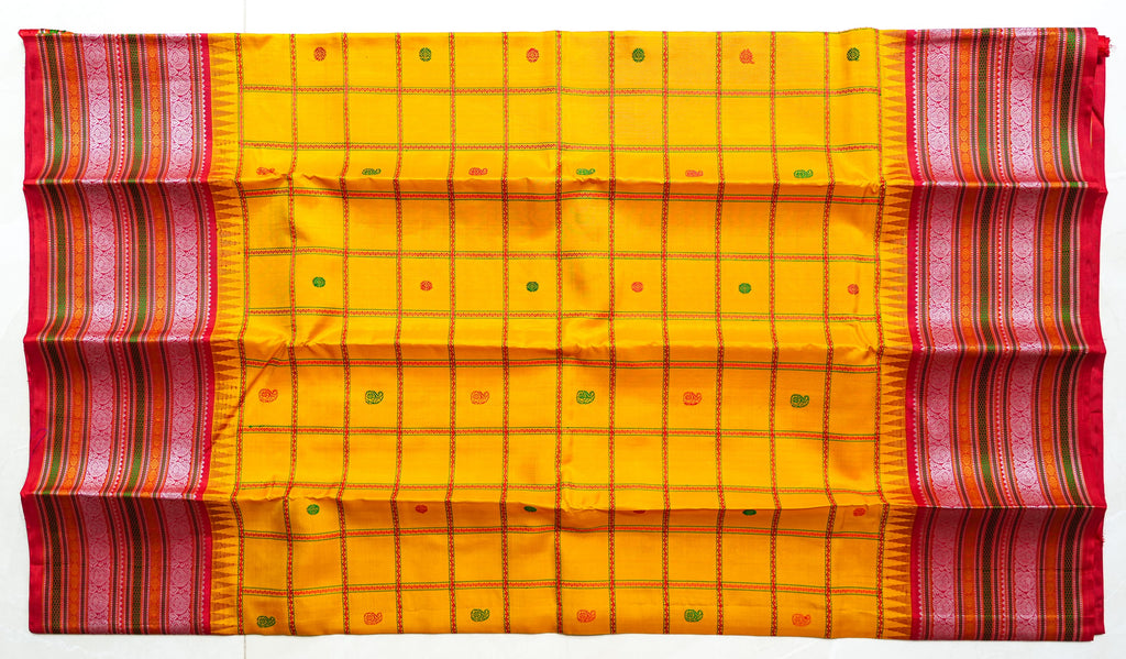 Arishina silk saree: turmeric checks with a red temple border (laid flat)