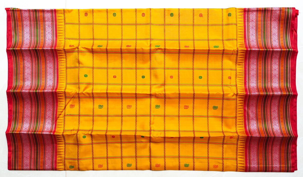 Arishina silk saree: turmeric checks with a red temple border (laid flat)