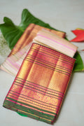 Cream & Pink Striped Silk Saree: cream silk with pink pinstripes and a maroon and gold zari border (folded)