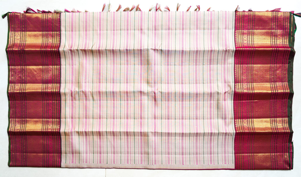 Cream & Pink Striped Silk Saree: cream silk with pink pinstripes and a maroon and gold zari border (laid flat)