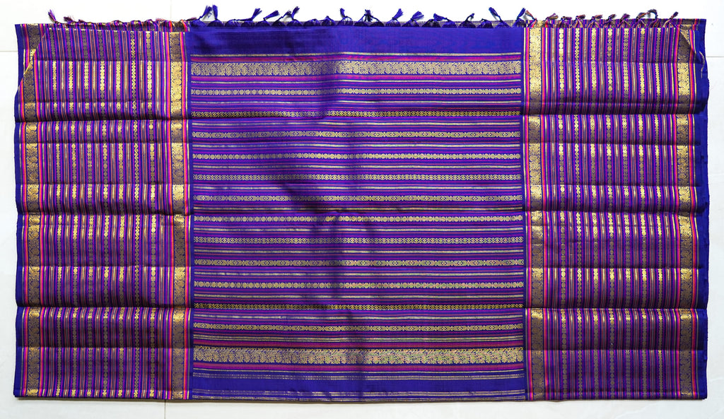 Neelambari silk saree: royal purple with gold zari stripes (laid flat)