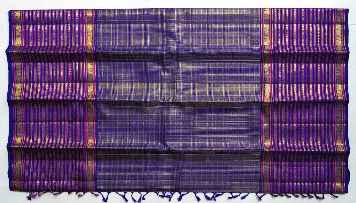 Neelambari silk saree: royal purple with gold zari stripes (laid flat)
