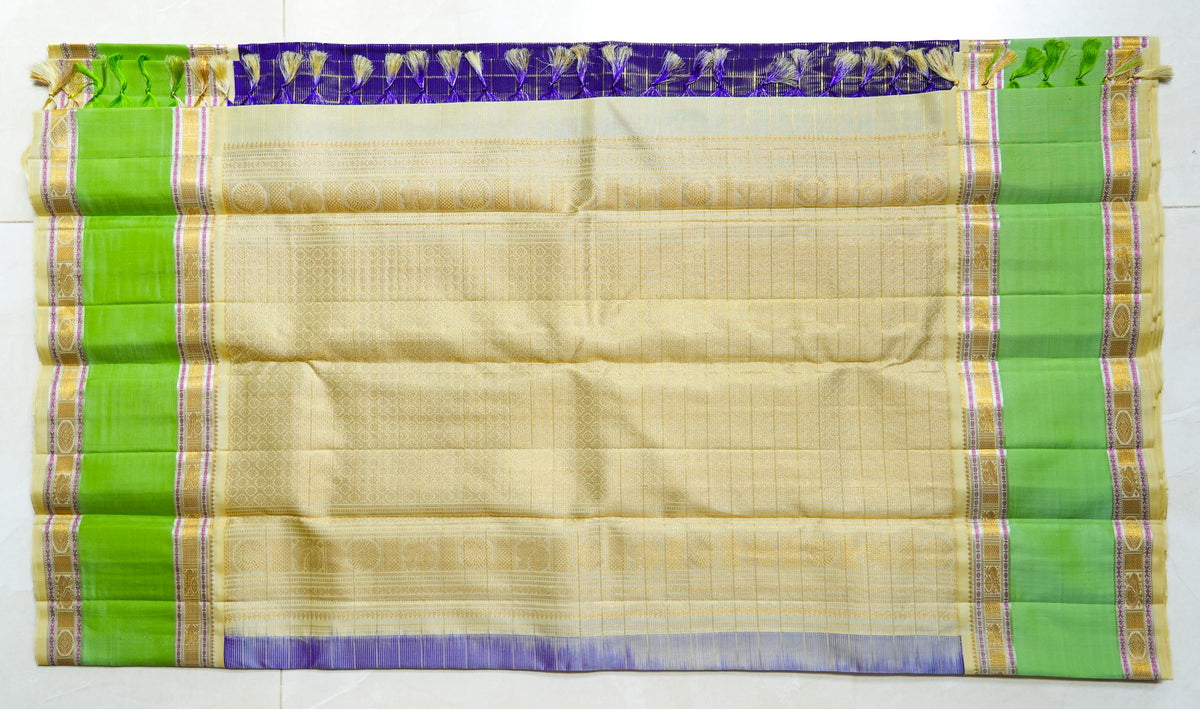 Purple Checked Silk Saree with Pistachio Border: purple zari checks with a pistachio-green border and a cream pallu (laid flat)