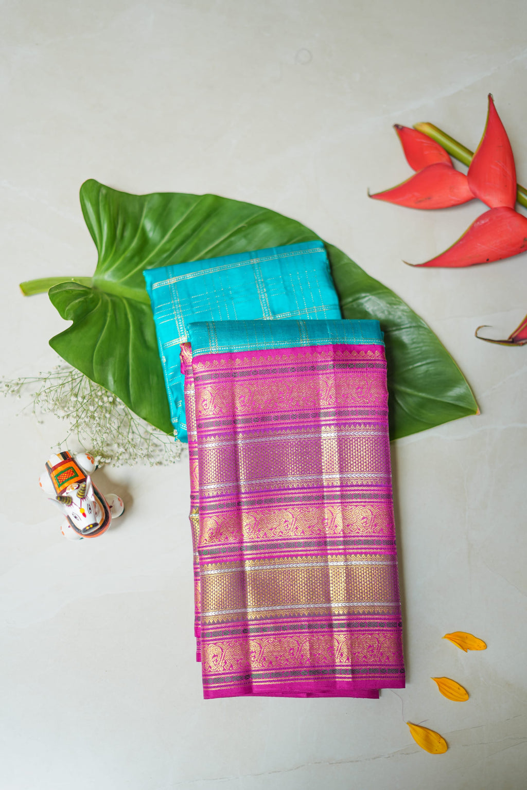 Utsava silk saree: rani pink with gold brocade stripes (folded)